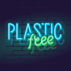 Neon plastic free lettering. Isolated glowing text illustration on eco living on brick wall background.