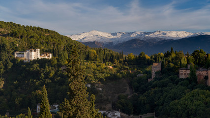 Fototapeta na wymiar View of town with snowcapped mountain in the background, Granada, Spain