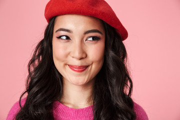 Image of optimistic beautiful asian girl with long dark hair smiling