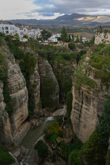 Fototapeta na wymiar Guadalev�n River streaming through canyon of Ronda, Malaga Province, Spain