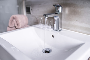 Modern bathroom faucet, Very high end faucet, sink, and counter in a luxury bathroom