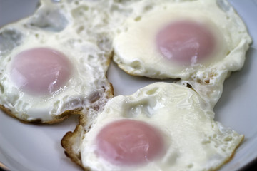 Three fried eggs for healthy breakfast . - 310440104