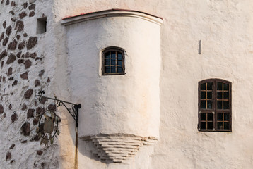 Bow window and windows on the facade of the Round Tower, Vyborg, Leningrad Oblast, Russia