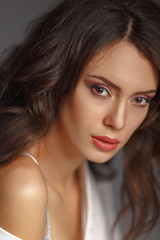 Obraz premium Expressive portrait of a young attractive girl