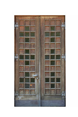 Very old wooden doors, isolated, narrow and tall with small glass inserts