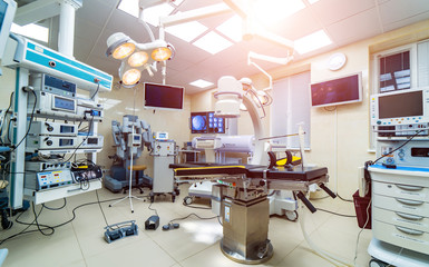 Medical devices, Interior hospital design concept. Interior of operating room in modern clinic, screen with tests closeup