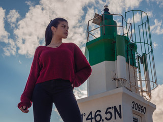 girl in a lighthouse making a perspective photo up