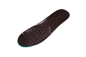 Brown orthopedic insole on a white background
