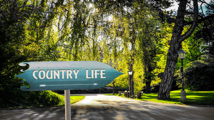 Street Sign to Country Life