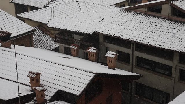 Heavy snowfall in a wintry mountain alpine village.