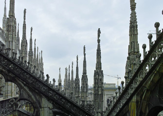 Fototapeta na wymiar looking Duomo di Milano meaning Milan Cathedral in Italy, with blue sky