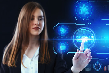 Business, Technology, Internet and network concept. Young businessman working on a virtual screen of the future and sees the inscription: Customer engagement