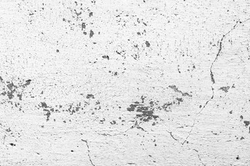 Texture of a concrete wall with cracks and scratches which can be used as a background