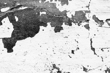 Texture of a concrete wall with cracks and scratches which can be used as a background