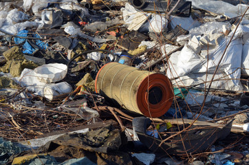 Obraz premium Nature near Ukrainian capital. Trash burning. Air pollution. Environmental contamination. Illegal junk dump. Near Kiev, Ukraine