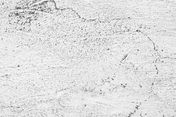 Texture of a concrete wall with cracks and scratches which can be used as a background