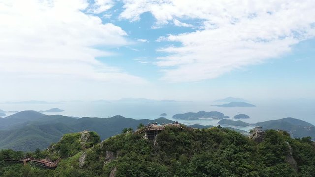 Tongyeong, South Korea 30 August 2019: 4K Aerial Drone Footage View of Mireuk Mountain. The mountain has a fantastic view overlooking the south sea.