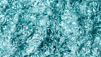 abstract wrinkled aluminum foil, background for christmas decoration, shallow depth of field