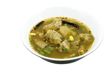 hot and spicy beef with tamarind and Thai herbs soup on bowl 