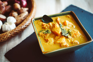 Curry on black slate tray 