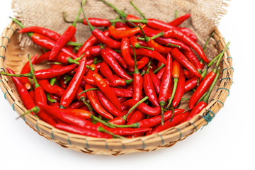 Fresh red chilies placed on sackcloth