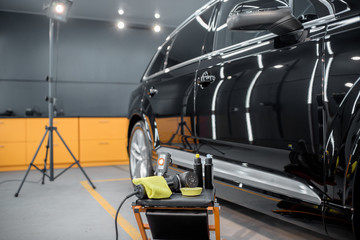 Professional equipment for automotive body polishing at the car service. Car detailing tools for vehicle care
