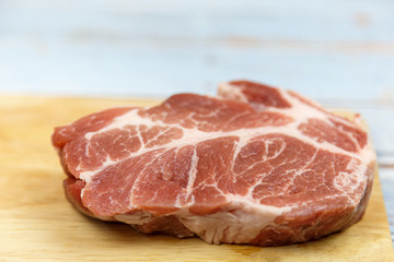 Pork tenderloin, sliced ​​on a stick, prepared for cooking