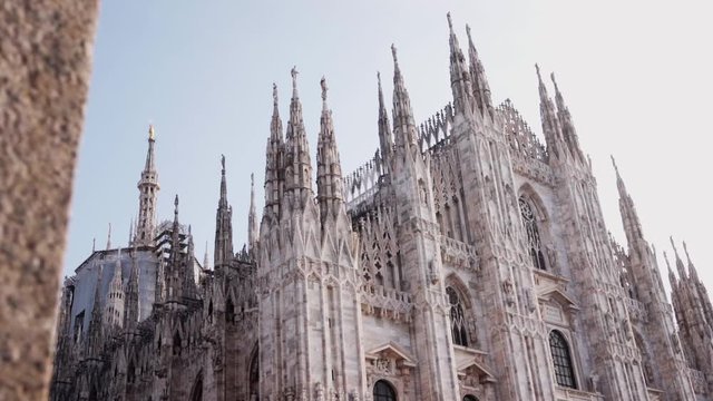 Smooth camera movement on the Duomo of Milan, Italy. Concept of europe traveling discovering art and culture.