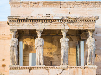 Caryatid statues in ancient Erechtheion temple in Acropolis of Athens in Greece