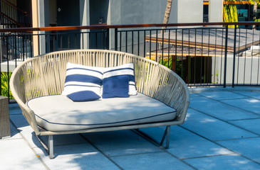 pillows on outdoor patio chair