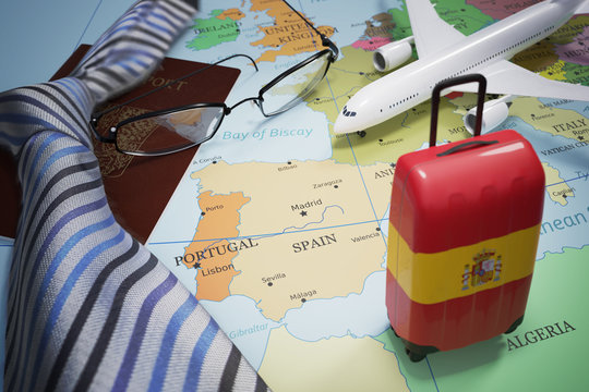 Vacation to Spain and tourism concept. Suitcase with spanish flag. 3D rendered illustration.
