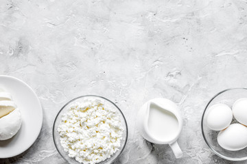 Healthy food concept with milk and eggs on table top view mockup
