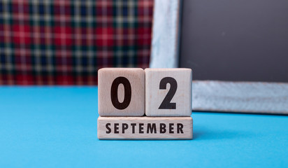 September 2 written with wooden blocks