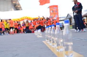 crowd of people walking on city street