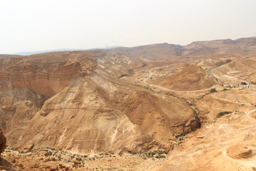 Judaean Desert mountain panorama with wadis seen from Masada fortress, Israel