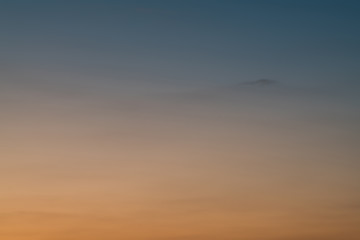 Sky gradient from blue to orange sunset