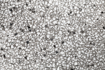 Vintage stone flooring with white and gray marble fragments