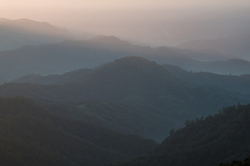 morning and sunrise on the winter season over the mountain layer at chingmai , thailand.