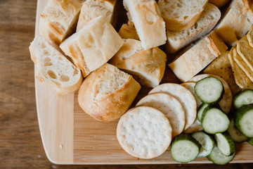 bread on a wooden board - 310463364