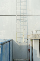 the ladder installed upon a water tower on the roof