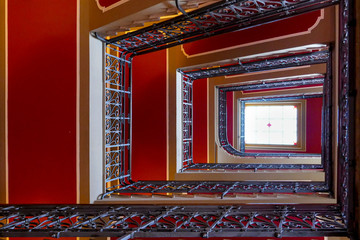 Red Staircase with Black Railing