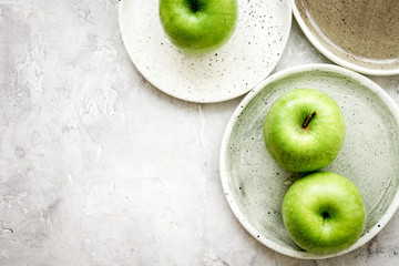 ripe green apples stone table background top view space for text