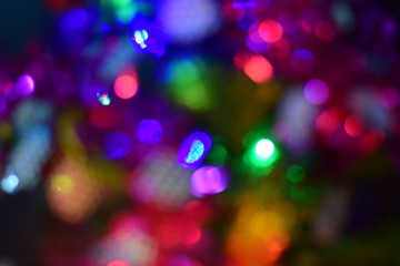 christmas background, image blur colorful bokeh defocused lights decoration on christmas tree