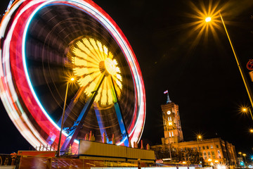 Rotes Rathaus in Berlin Germany, in the foreground a ferris wheel, Christmas market, Christmas...