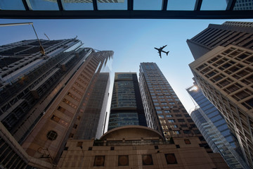 Commercial airliner flying low over Hong Kong