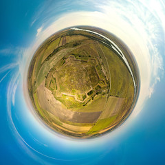 aerial view of a small planet - from above on the Annenskaya fortress near the city of Starocherkassk (the old capital of the Don Cossacks on a bright sunny day 