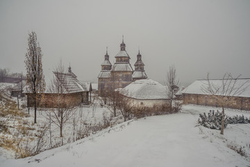 Snowfall in the old Ukrainian city.
