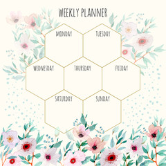 weekly planner with floral watercolor
