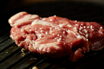 Korean BBQ, meat on iron plate 