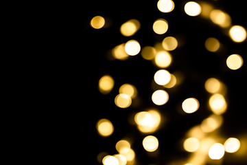 Festive overlay effect. Golden circles bokeh festive glitter dark background. Christmas, New Year, holidays design. Copy space